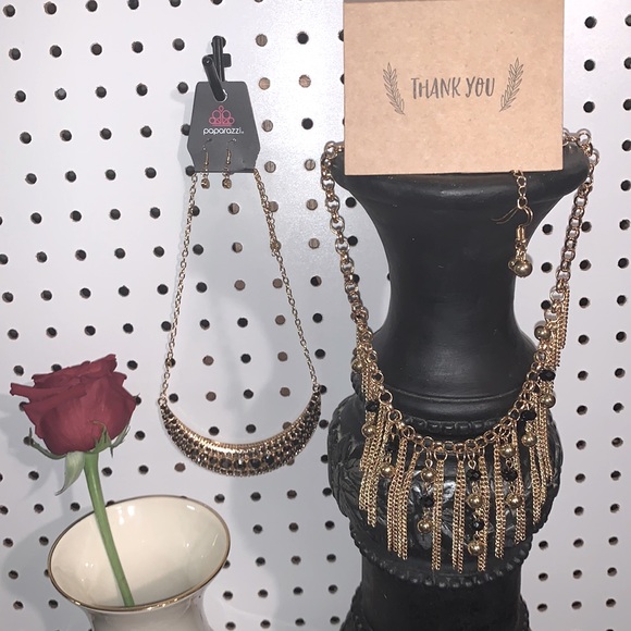 Two Gold and Black Necklace and Earring Set.